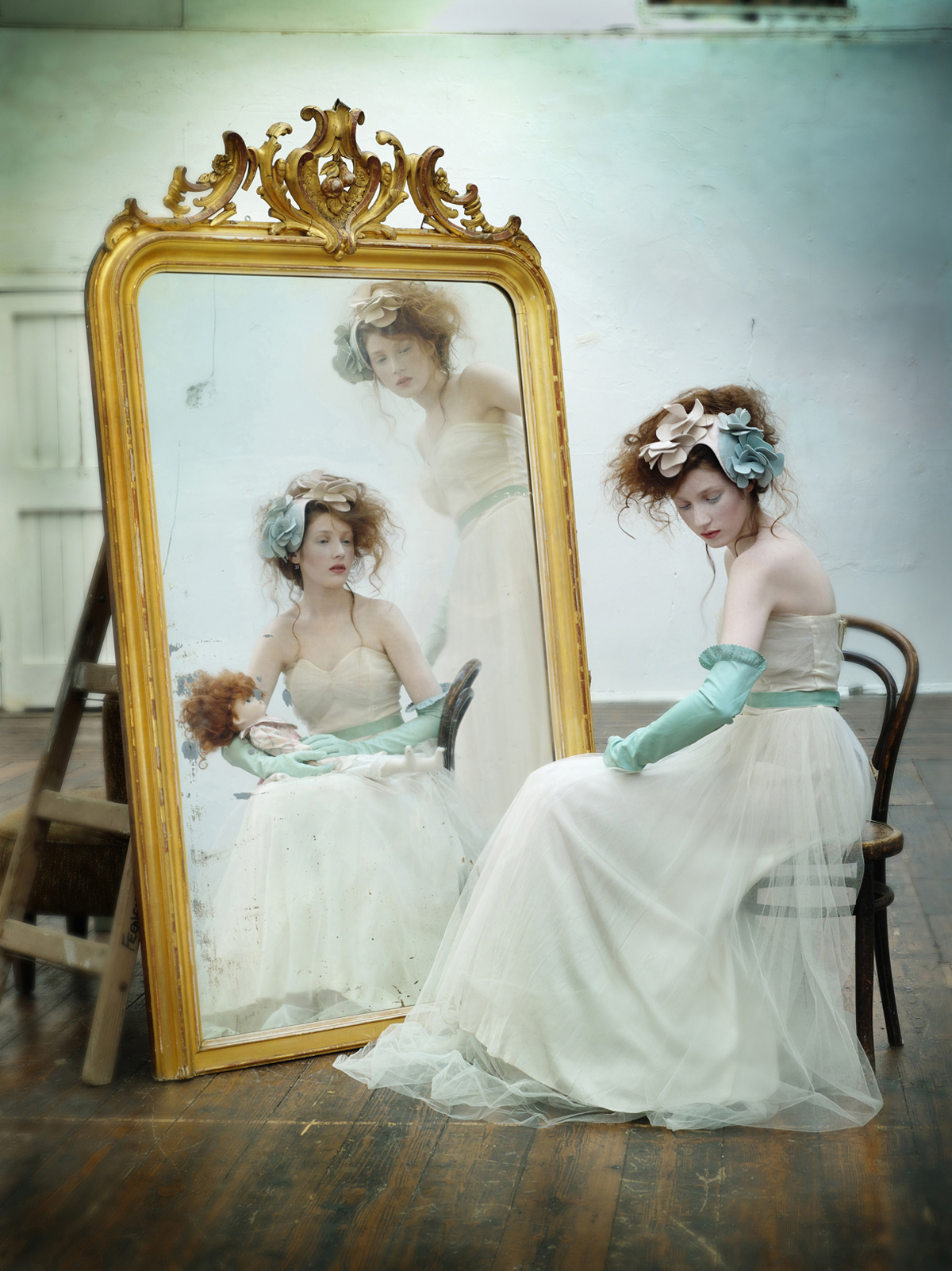 studio fashionshoot with irish model and vintage mirror