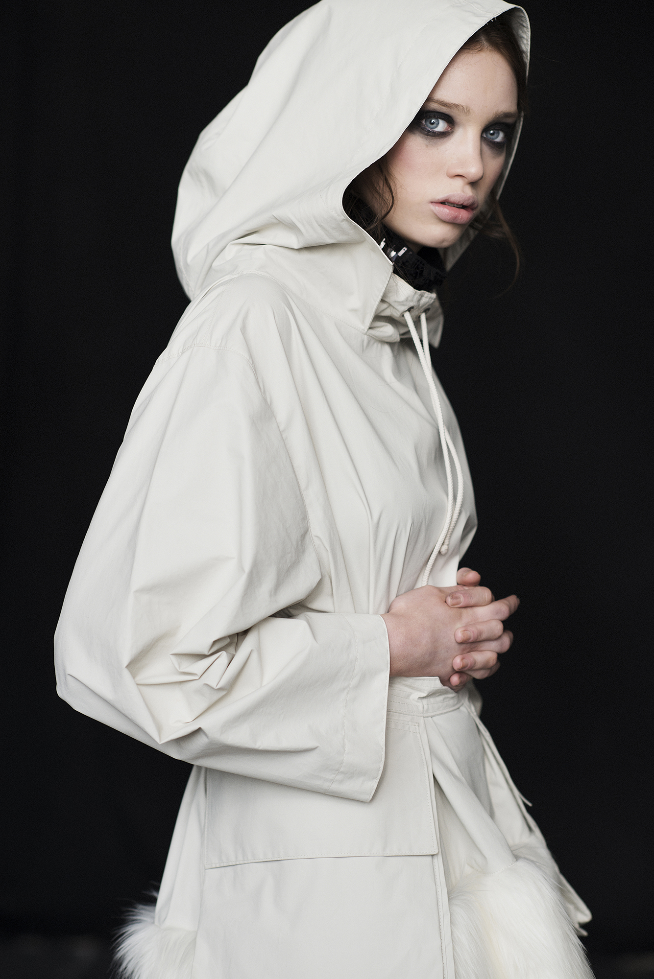 moody fashion editorial studio shoot of a model wearing contemporary irish designer clothes