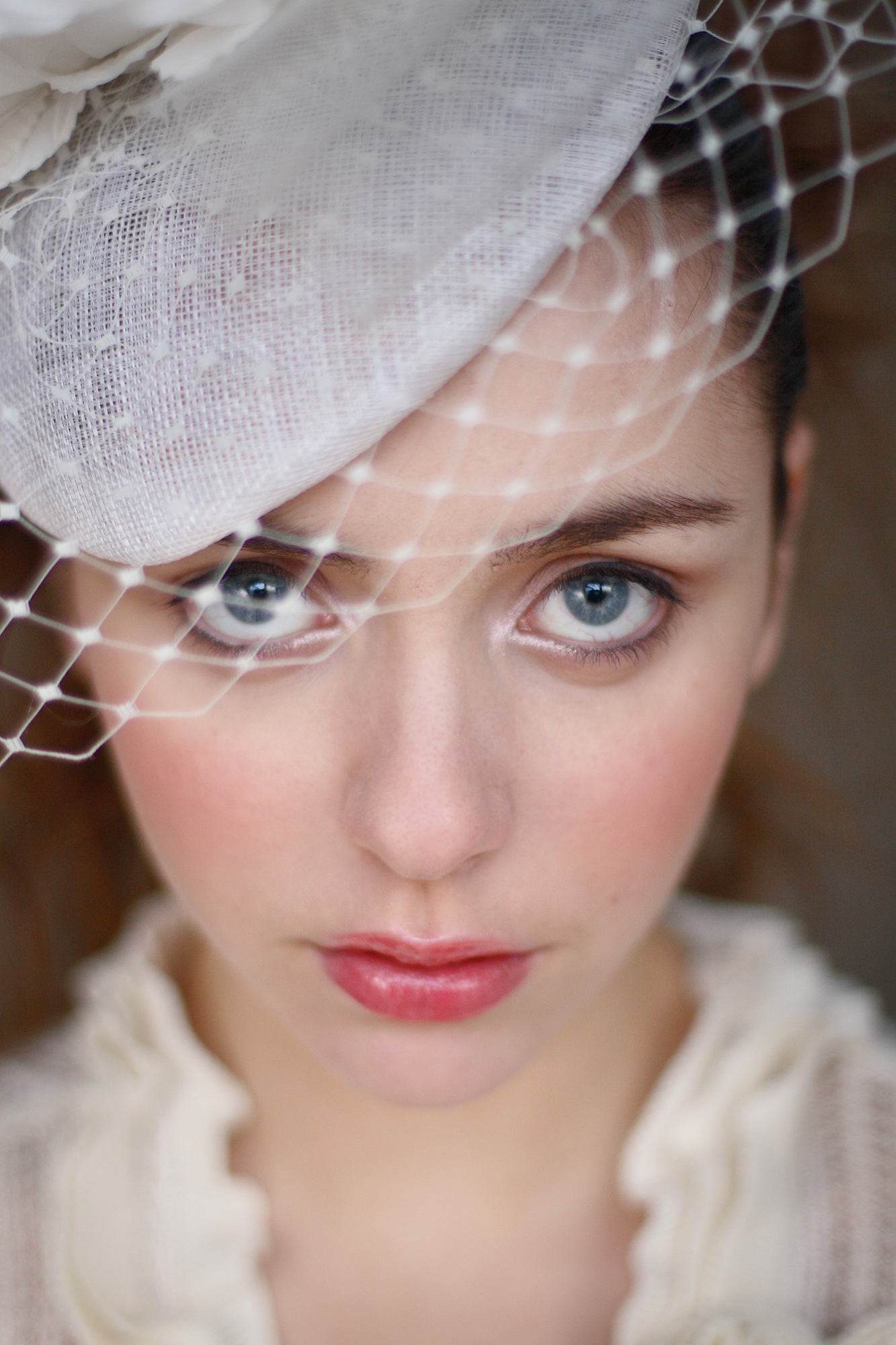 fashion shoot of an irish model in irish hat designer in the studio
