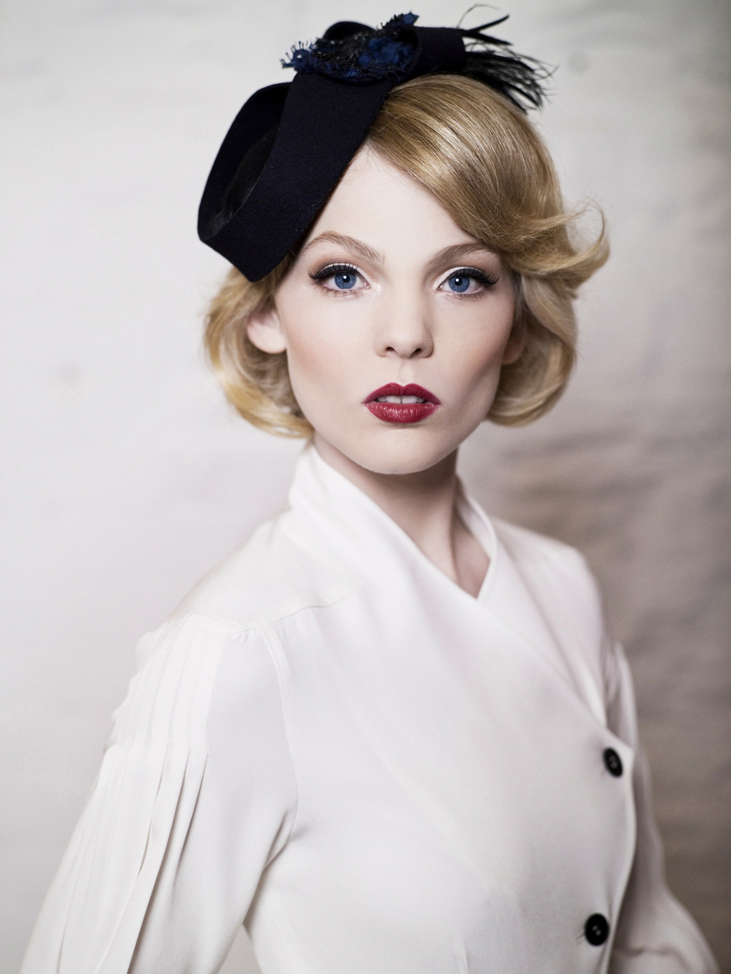 fashion shoot of an irish model in irish hat designer in the studio